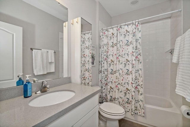 full bathroom featuring vanity, toilet, and shower / bath combo with shower curtain