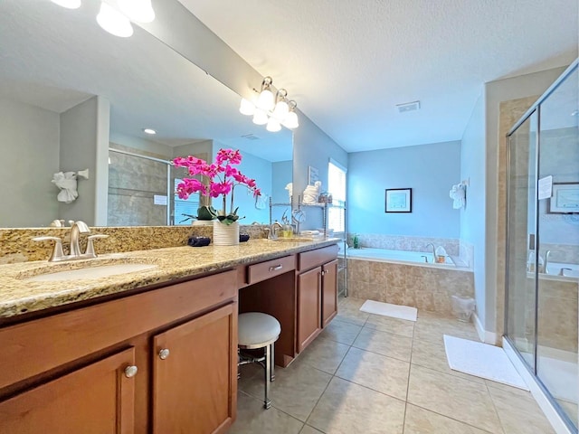 bathroom featuring separate shower and tub, tile patterned floors, and vanity