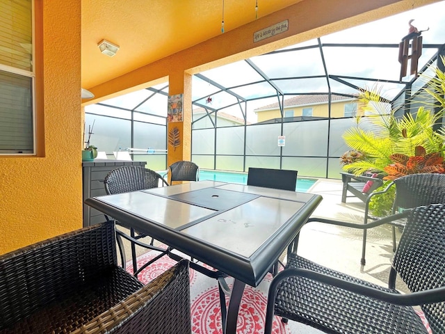 view of patio / terrace with glass enclosure