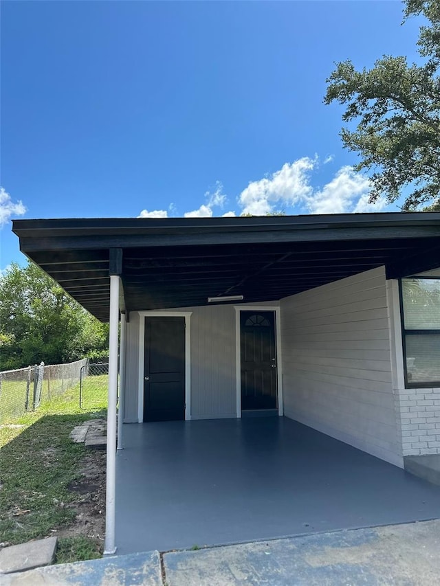 garage with a carport