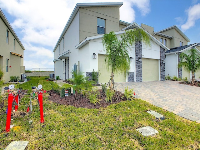 view of front of home with a garage