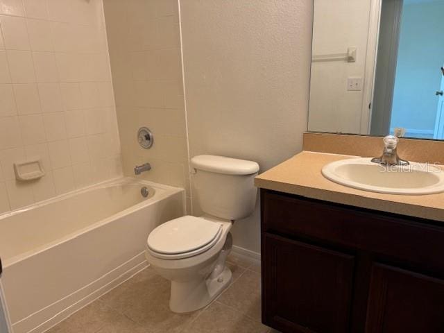 full bathroom with tile flooring, vanity, toilet, and bathing tub / shower combination