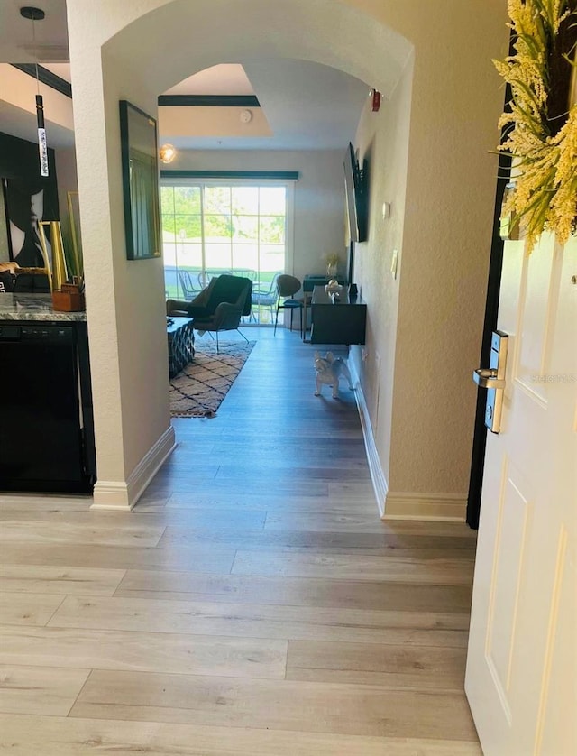 hallway with light wood-type flooring