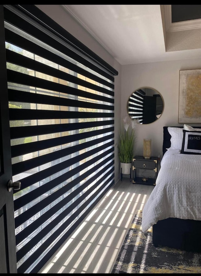 bedroom with crown molding