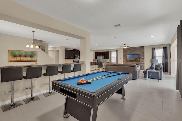 playroom with ceiling fan, pool table, and light tile patterned flooring