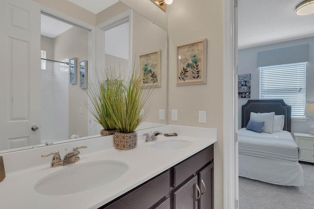 bathroom with vanity and a healthy amount of sunlight