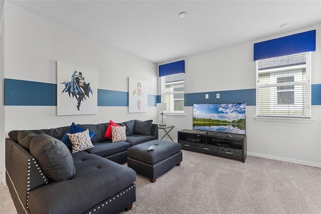 carpeted living room featuring a textured ceiling