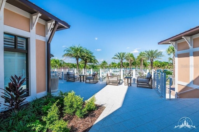 view of patio featuring a water view