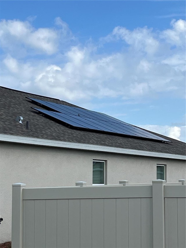 exterior space featuring solar panels