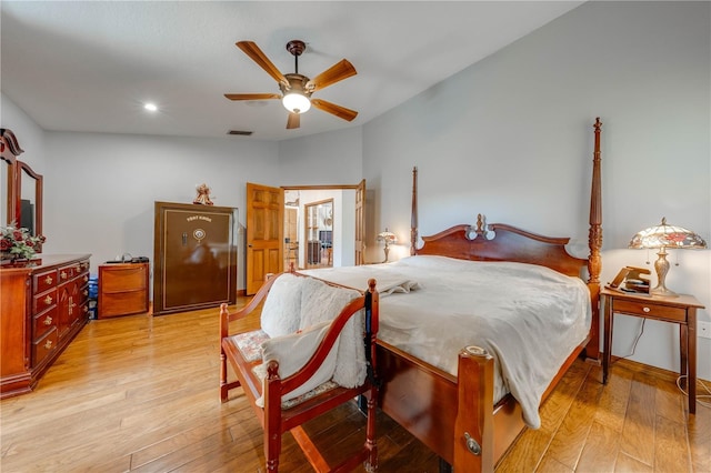 bedroom featuring lofted ceiling, recessed lighting, visible vents, light wood-style flooring, and a ceiling fan