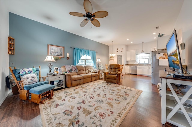 living room featuring a ceiling fan, recessed lighting, dark wood-style flooring, and visible vents