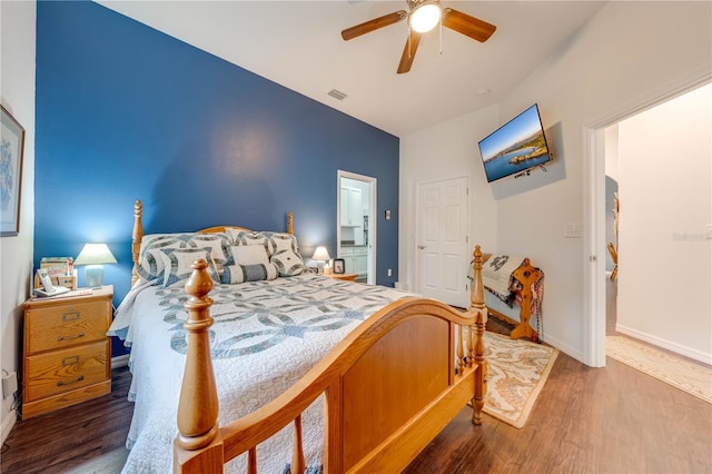 bedroom featuring ceiling fan and hardwood / wood-style floors