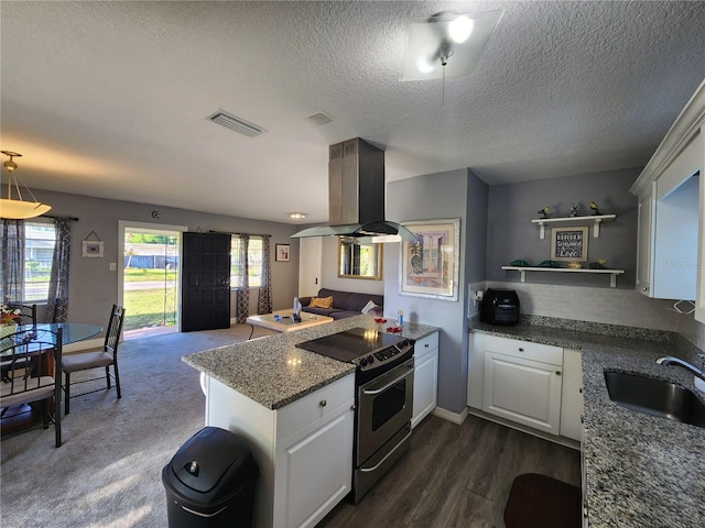 kitchen with dark hardwood / wood-style floors, island range hood, stainless steel electric range, sink, and white cabinetry