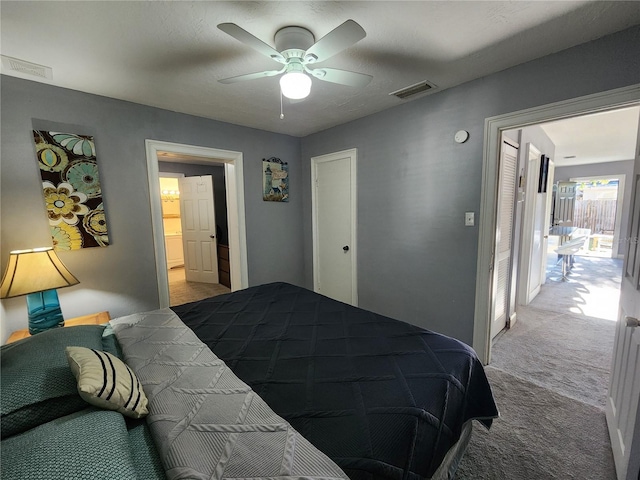 bedroom with ceiling fan and carpet floors