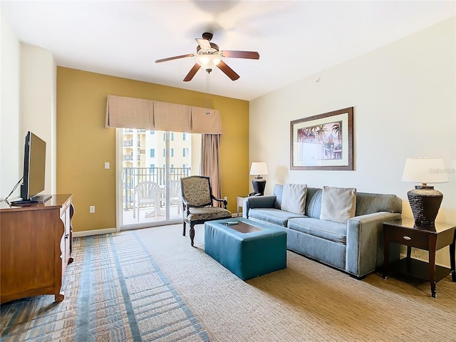 living room with ceiling fan