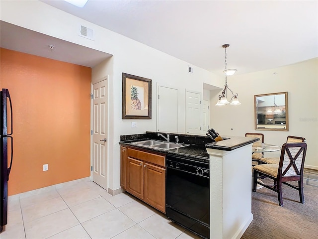 kitchen with sink, light tile patterned floors, black appliances, and pendant lighting