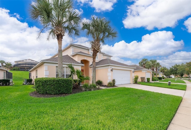 view of front of house featuring a front yard and a garage