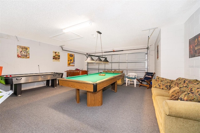 rec room featuring a textured ceiling and billiards