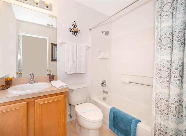 full bathroom with tile patterned flooring, vanity, shower / bath combo, and toilet