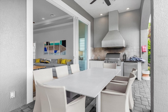 view of patio / terrace with exterior kitchen, grilling area, and ceiling fan