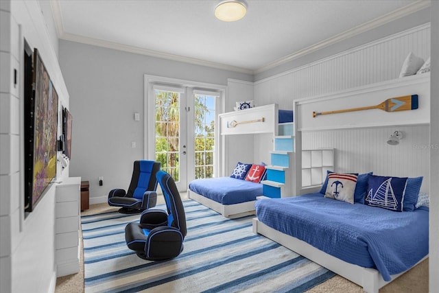 bedroom featuring carpet floors, access to outside, ornamental molding, and french doors