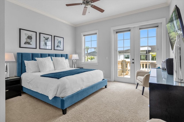 carpeted bedroom with access to exterior, crown molding, french doors, and ceiling fan