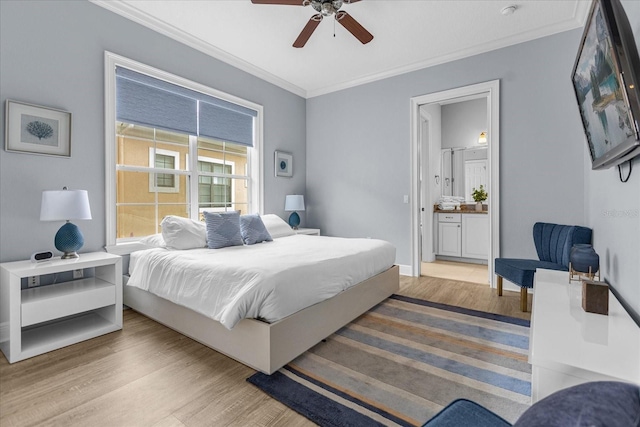 bedroom featuring ceiling fan, ornamental molding, connected bathroom, and light hardwood / wood-style flooring