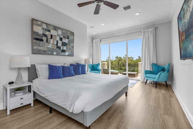 bedroom featuring access to exterior, crown molding, light hardwood / wood-style floors, and ceiling fan