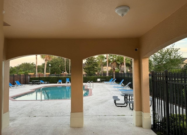 view of pool with a patio