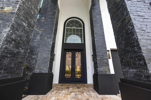 doorway to property with french doors