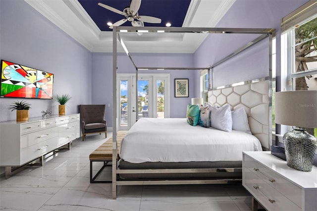 bedroom featuring ceiling fan, a raised ceiling, crown molding, and access to outside