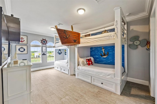 bedroom with ornamental molding