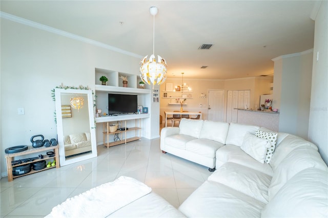 living room with a notable chandelier, light tile patterned flooring, and crown molding