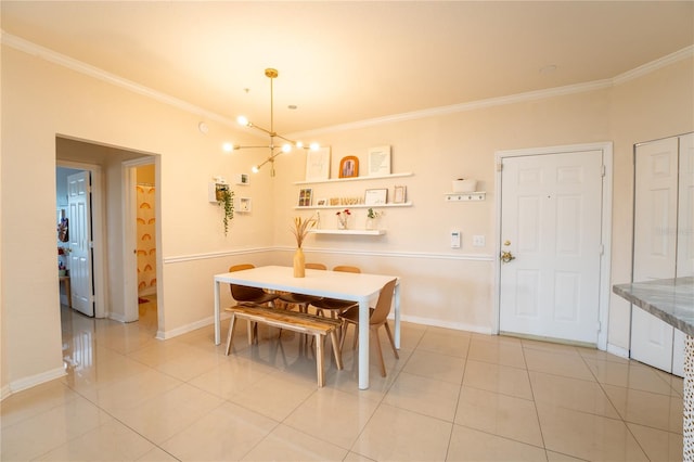 dining room featuring light tile patterned floors and ornamental molding