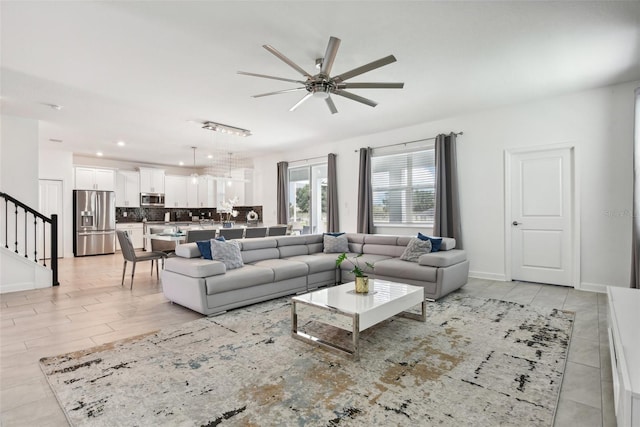 living room with ceiling fan