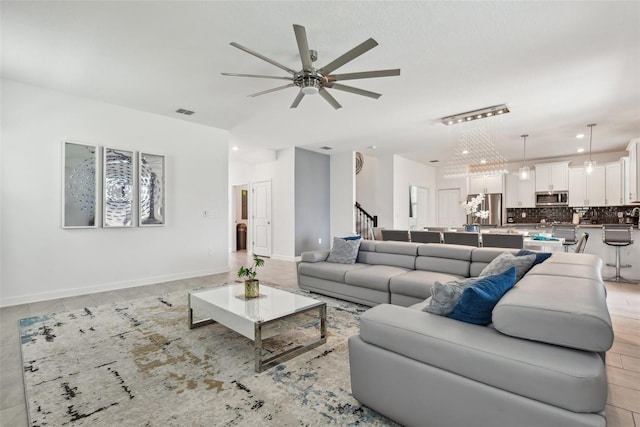 living room with ceiling fan