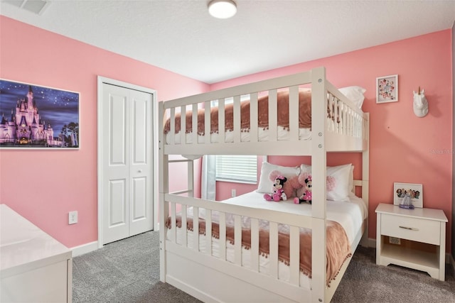 carpeted bedroom with a closet