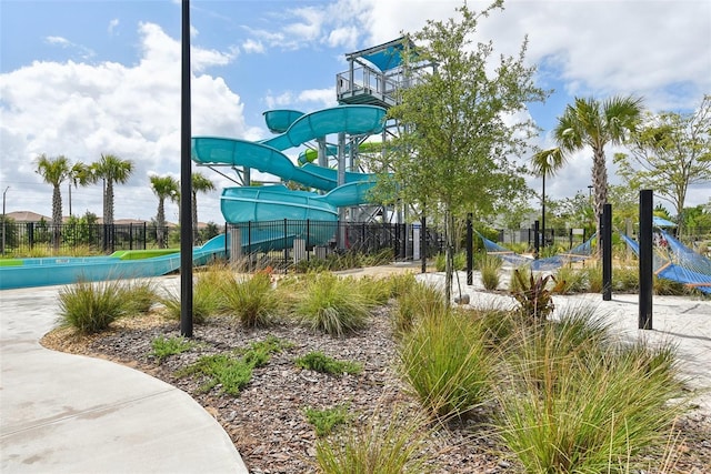 view of home's community with a playground