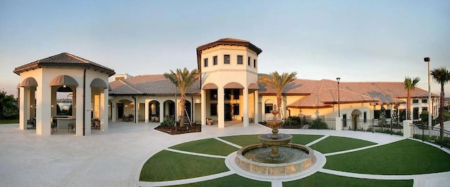 surrounding community featuring a patio