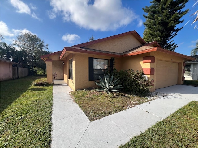 single story home with a front yard and a garage