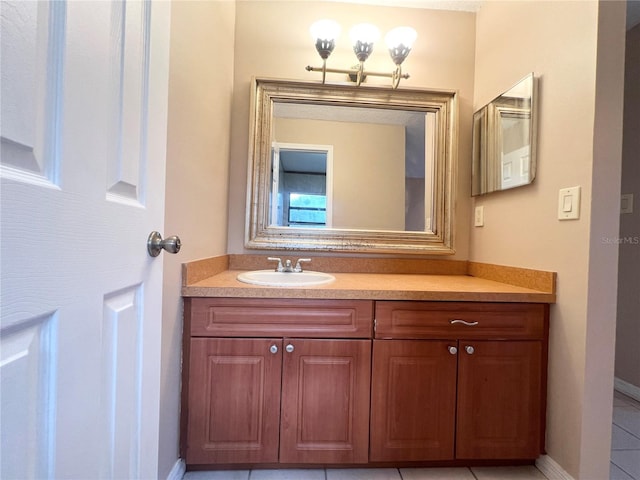 bathroom featuring tile patterned floors and vanity