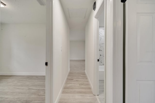 hallway featuring light wood-type flooring