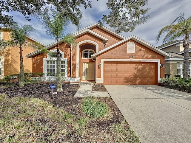 view of front of home with a garage