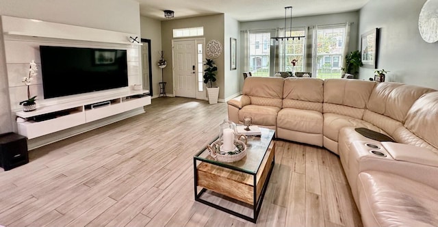 living room with light hardwood / wood-style flooring