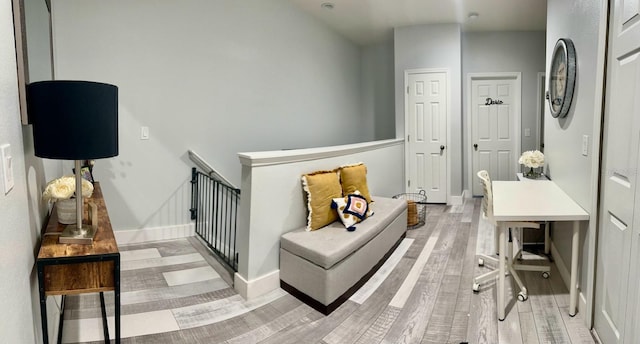 sitting room with light hardwood / wood-style flooring