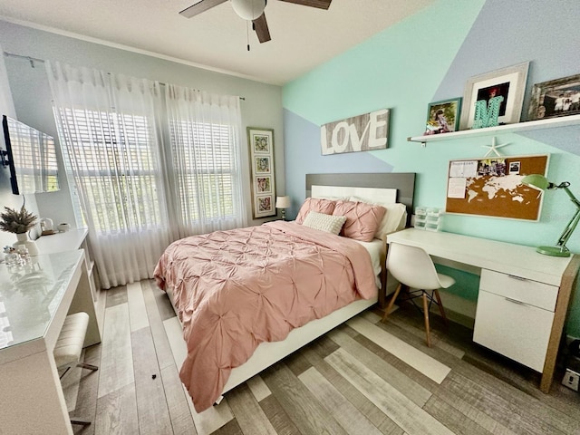 bedroom featuring ceiling fan and light hardwood / wood-style floors