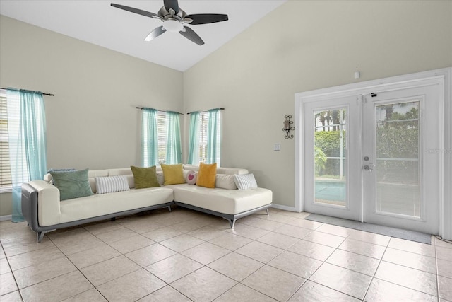 unfurnished living room featuring ceiling fan, light tile patterned flooring, and a wealth of natural light