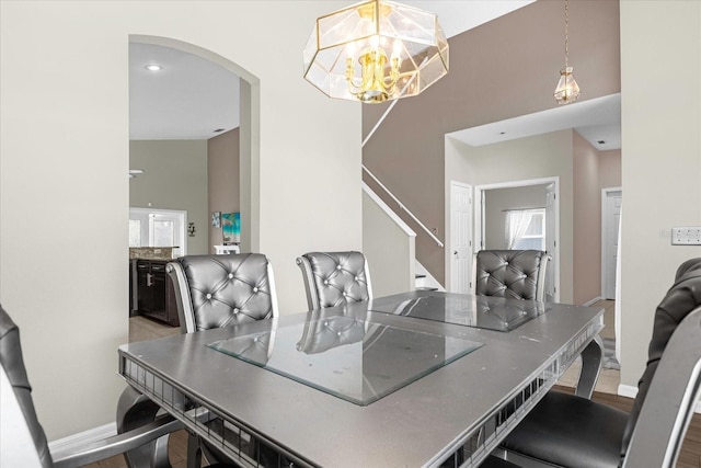 dining area with a notable chandelier