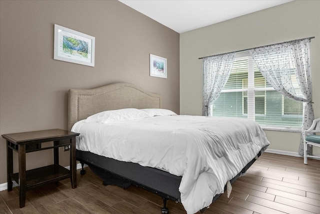 bedroom featuring hardwood / wood-style flooring