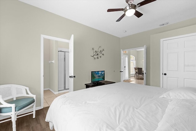 bedroom featuring ceiling fan and hardwood / wood-style floors